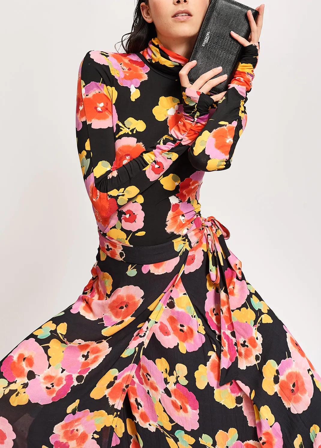 Black turtleneck top with floral-print